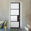 Chelsea 4 Pane Black Primed Single Evokit Pocket Door - Clear Reeded Glass