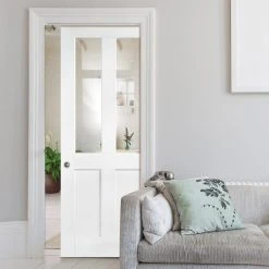 London Single Evokit Pocket Door - Clear Glass - White Primed