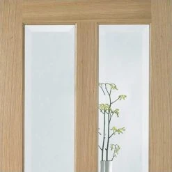 Top Mounted Black Sliding Track & Door - Richmond White Oak Door - No Raised Mouldings - Bevelled Clear Glass - Unfinished -LPD Door richmond rm0 p fin oak door lpd directdoors top1 1 82fd2313 d5e6 447b 8c34 3f28e33cf141